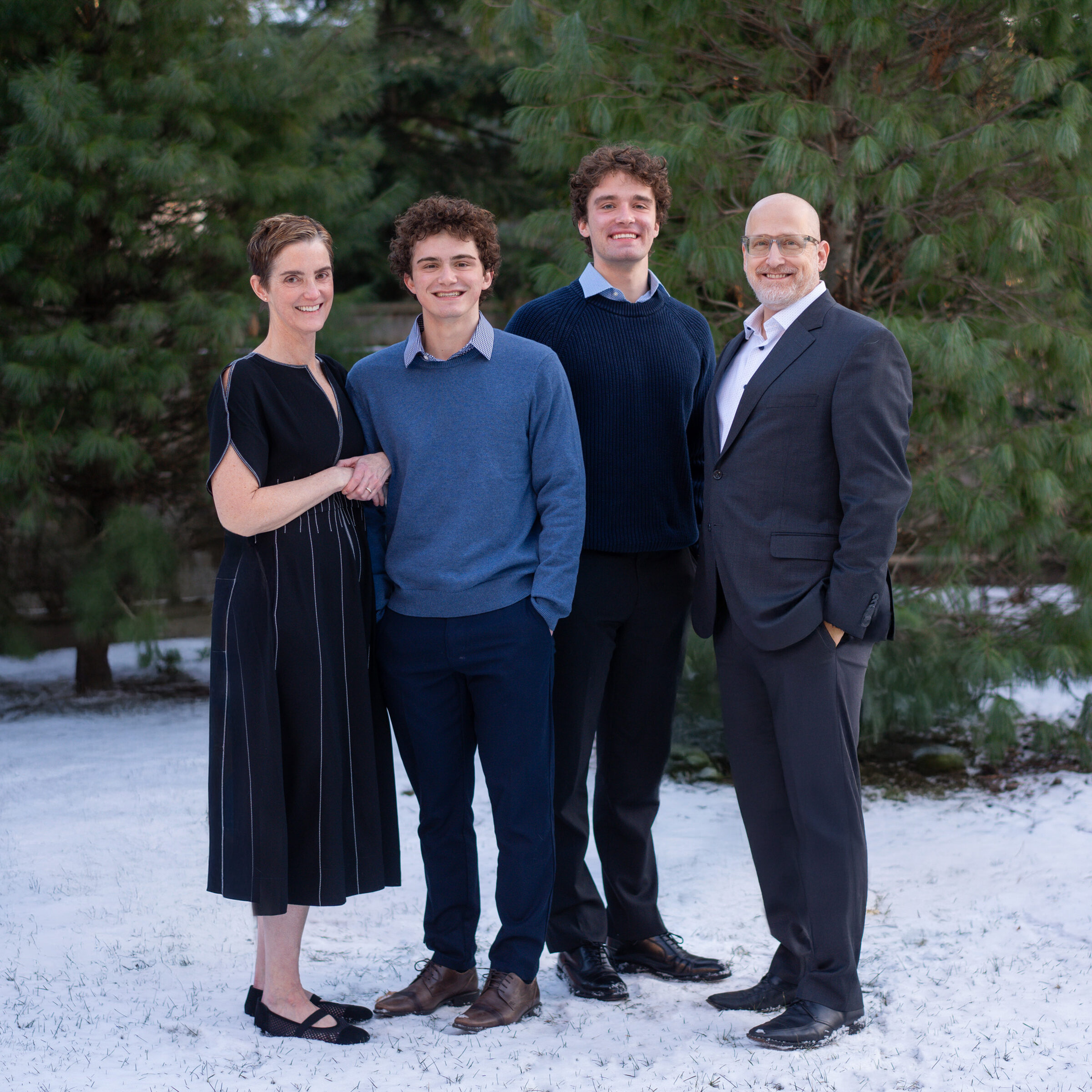 Family Portraits in Concord, MA center in the winter. Photographed by Chiha Portraits.