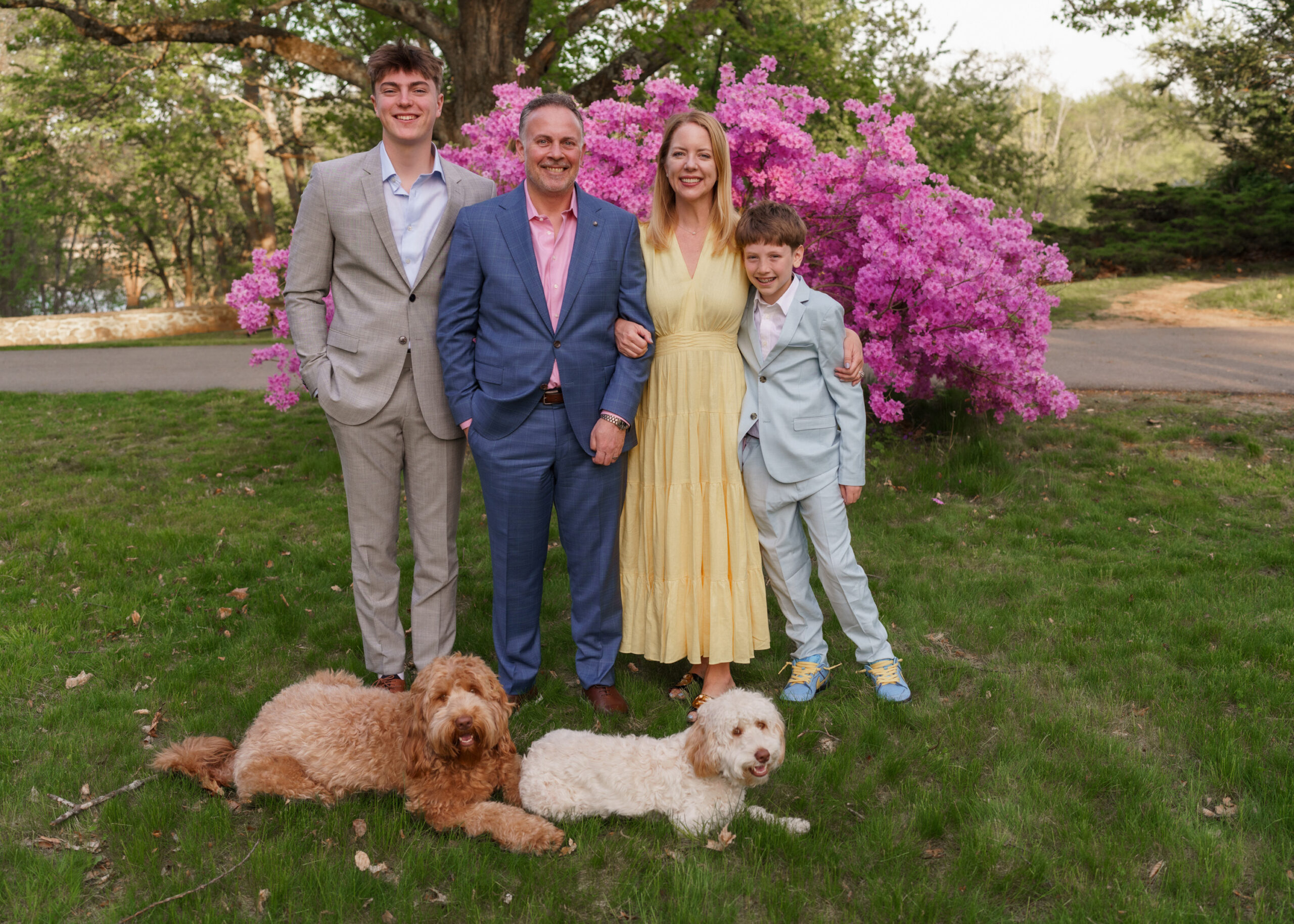 Family Portraits at the North Bridge in Concord, MA in the spring. Photographed by Chiha Portraits.